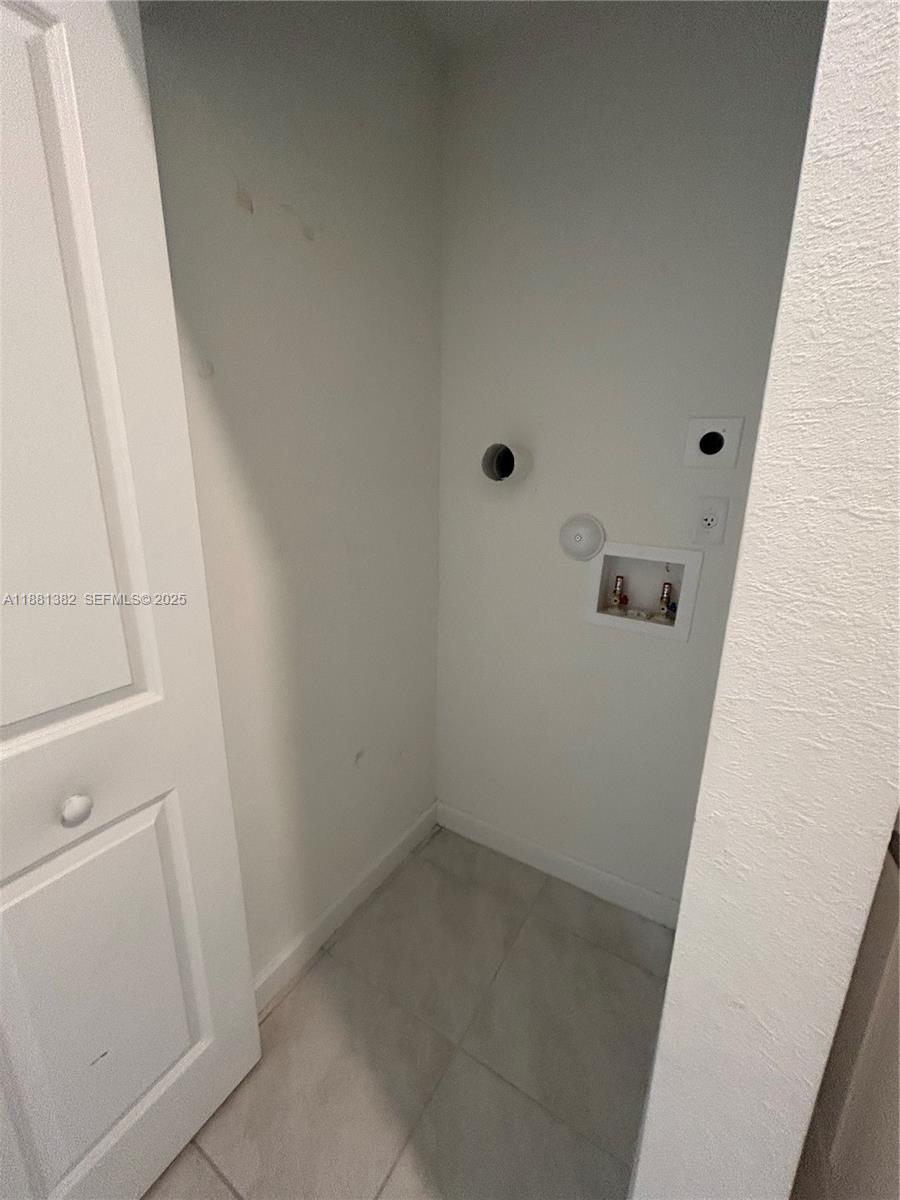 24030 Southwest 119th Place Homestead, FL 33032 - Photo 14 of 15 a view of a hallway