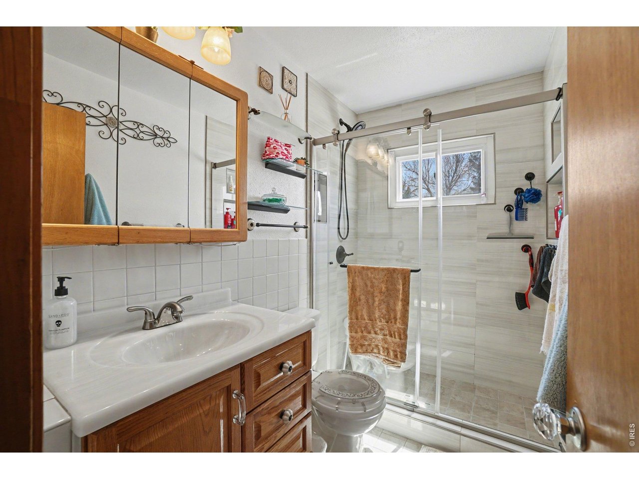 205 6th Street Mead, CO 80542 - Photo 15 of 37 Shared upper bathroom