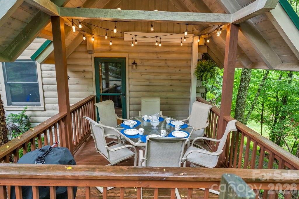 192 Dewitt Barnett Road, Unit 2 Vilas, NC 28692 - Photo 3 of 32 a view of balcony with furniture and outdoor view