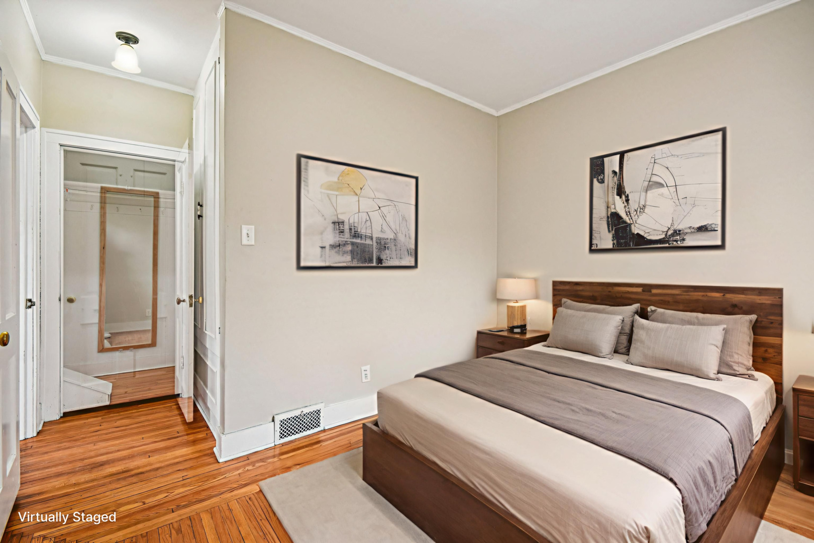 1246 Wauponsee Street Morris, IL 60450 - Photo 16 of 45 a bedroom with a bed and a painting on the wall