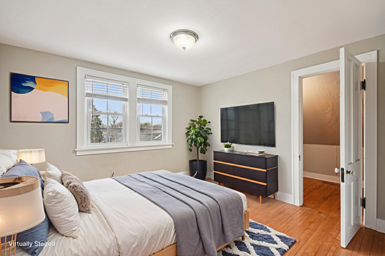 1246 Wauponsee Street Morris, IL 60450 - Photo 22 of 45 a bedroom with a bed and a television