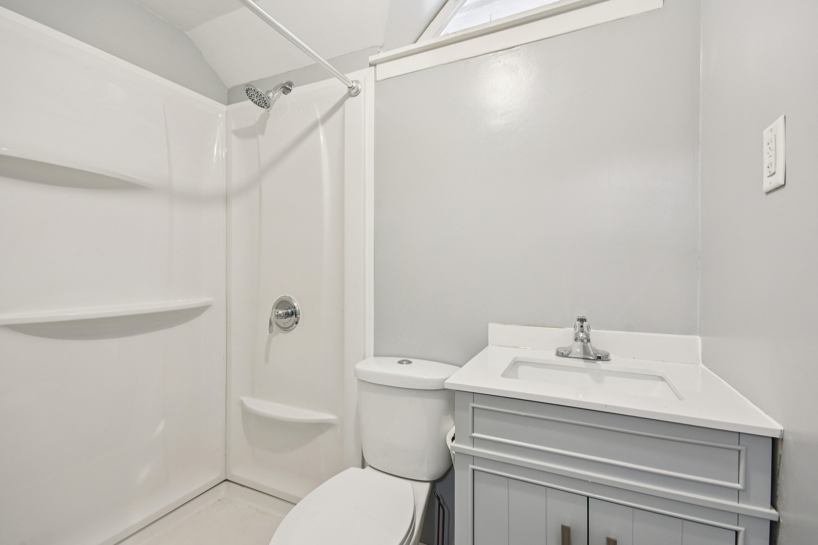 1246 Wauponsee Street Morris, IL 60450 - Photo 27 of 45 a bathroom with a sink a toilet and shower