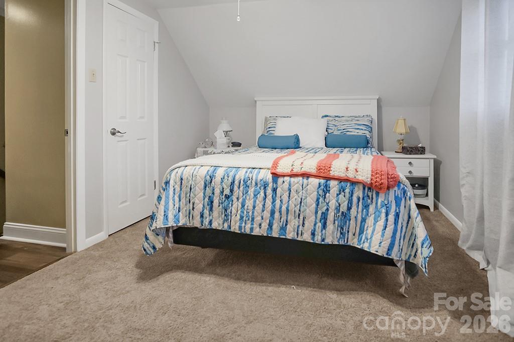 122 Rockman Road Grover, NC 28073 - Photo 27 of 45 a bedroom with a bed and a cabinets