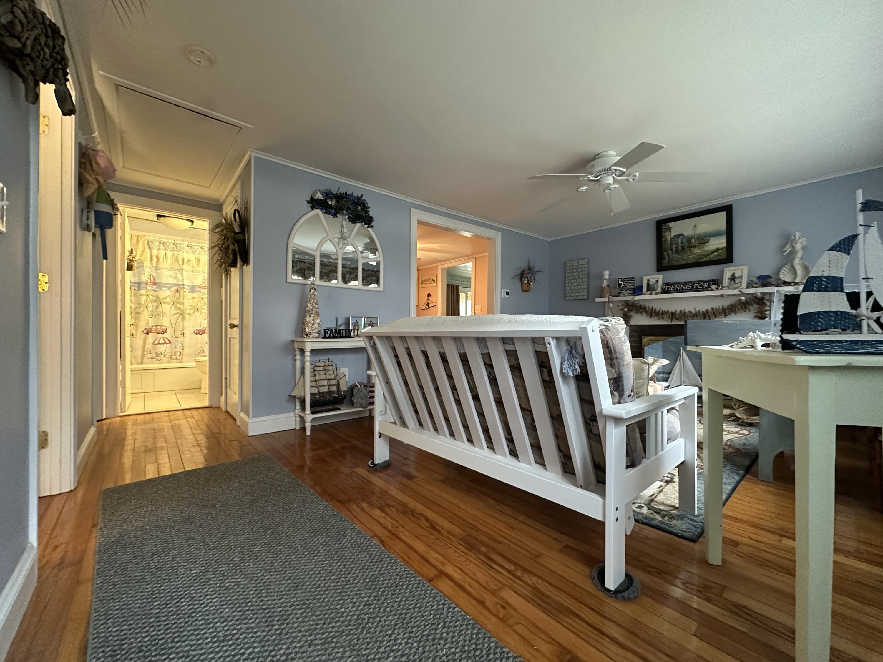 39 Naushon Road Dennis Port, MA 02639 - Photo 4 of 24 a view of a livingroom with furniture and windows