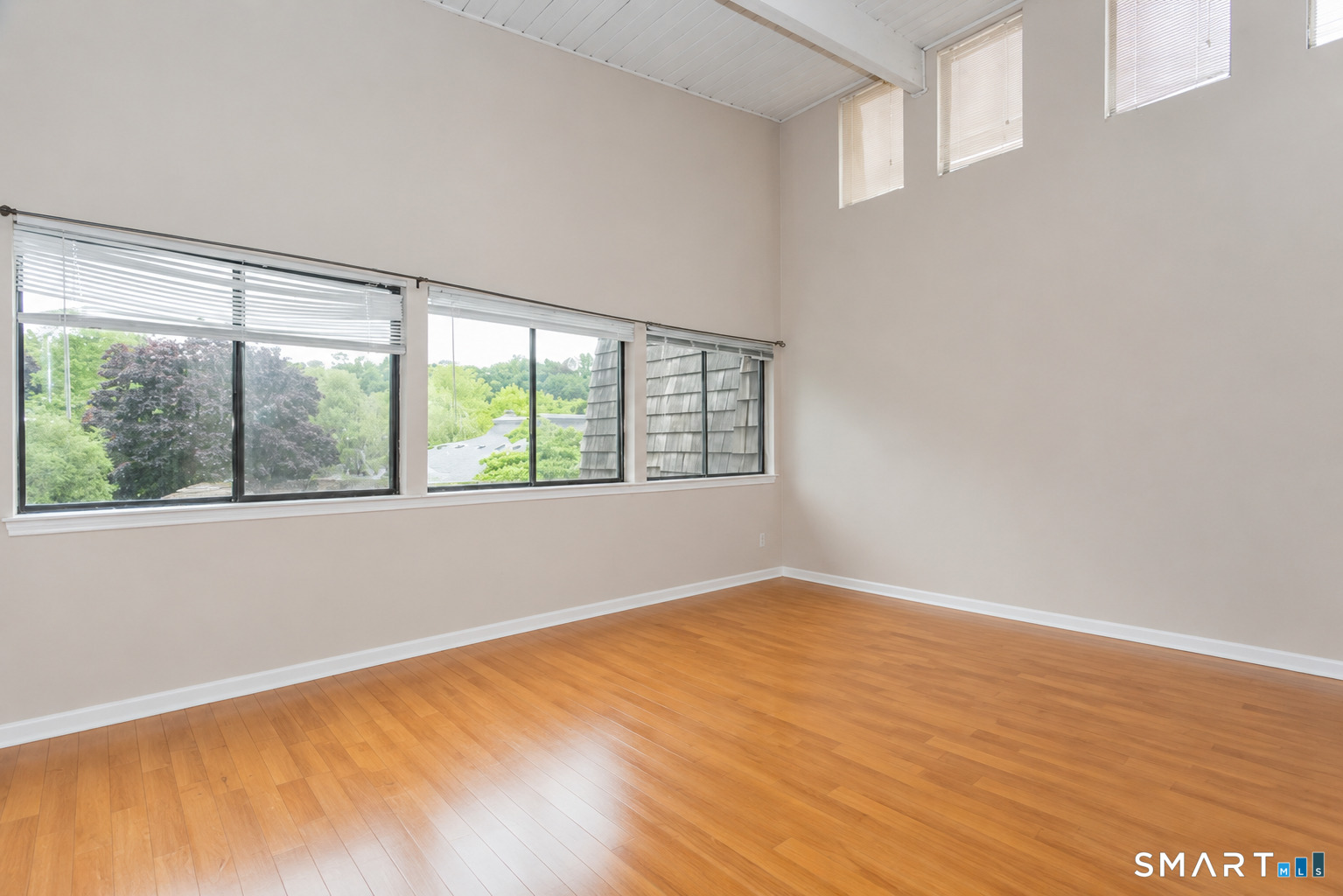 106 Gillies Lane, Unit 106 Norwalk, CT 06854 - Photo 16 of 36 Primary bedroom with cathedral ceiling and full bath.