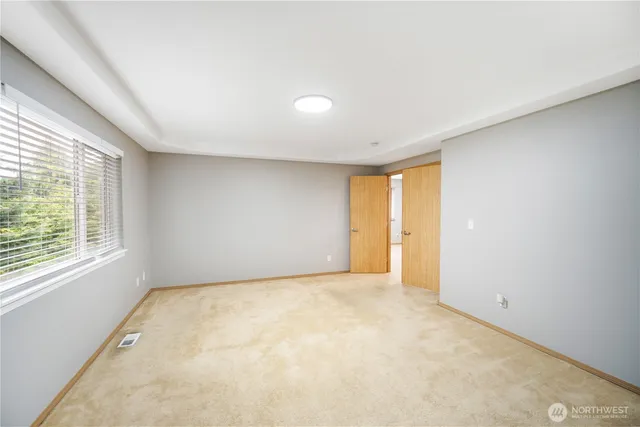 a bathroom with a sink a mirror and a bathtub