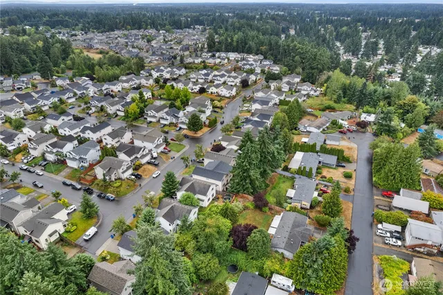 an aerial view of a city with lots of residential buildings