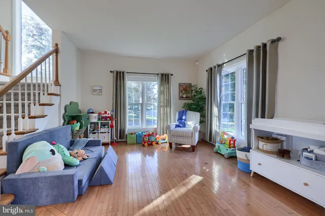 a bathroom with a sink mirror and vanity