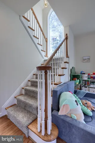 a bedroom with furniture and a fireplace