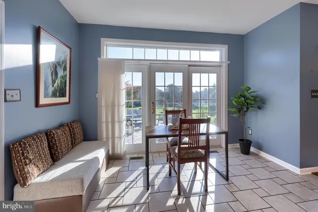 a kitchen with granite countertop a sink and a stove top oven