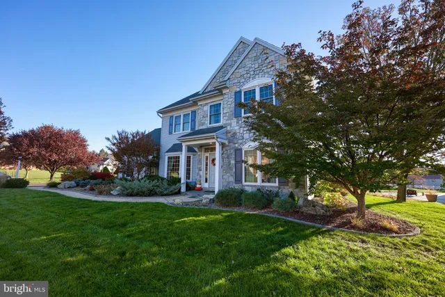 a house view with a backyard space