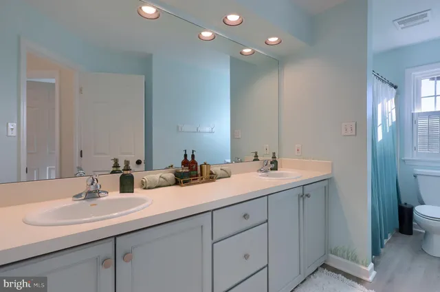 a view of a patio with chairs and a table