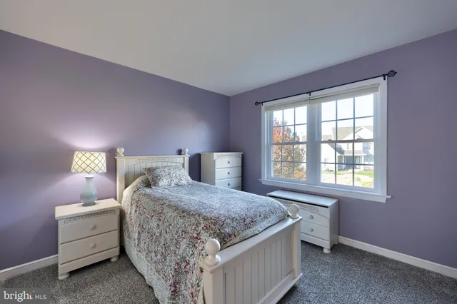 a view of a chairs and table in the patio