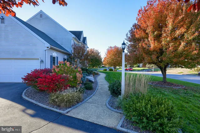 a view of livingroom with hardwood floor and a ceiling fan