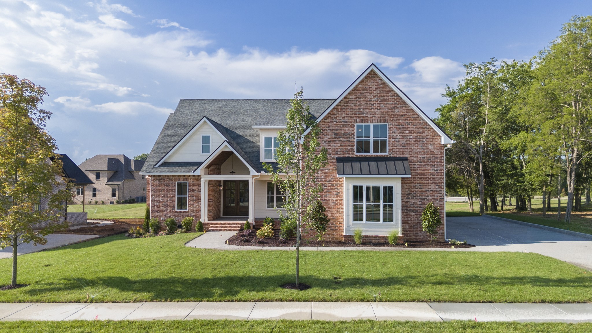 1107 Collin Drive Lebanon, TN 37087 - Photo 1 of 56 a front view of a house with a yard