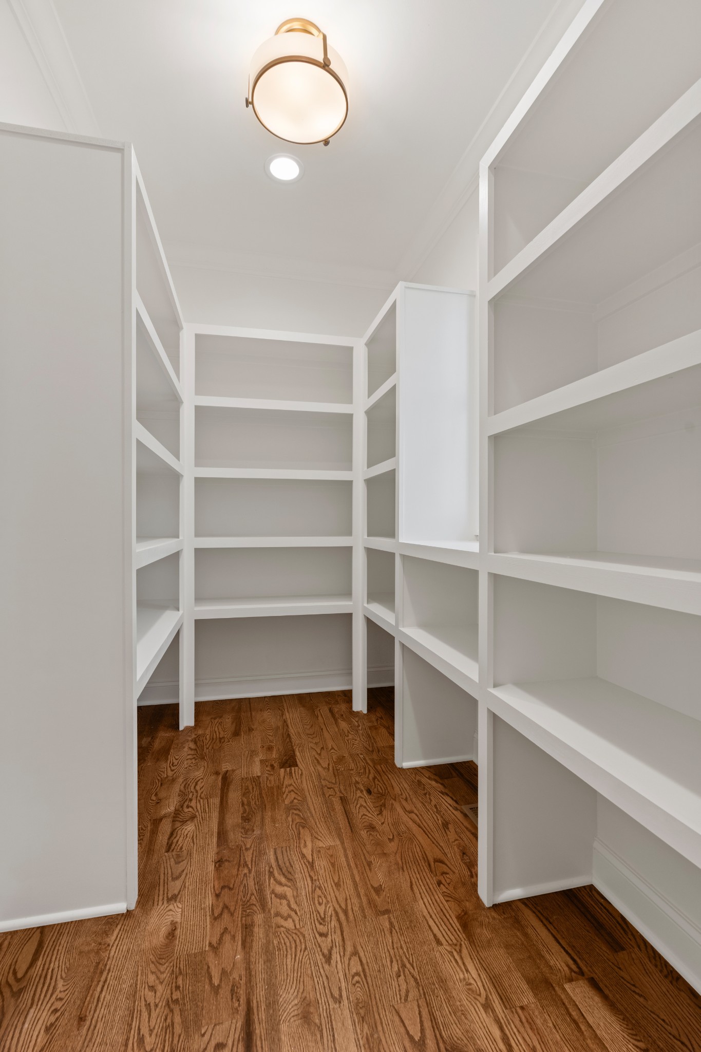 1107 Collin Drive Lebanon, TN 37087 - Photo 23 of 56 a room with walk in closet and wooden floor