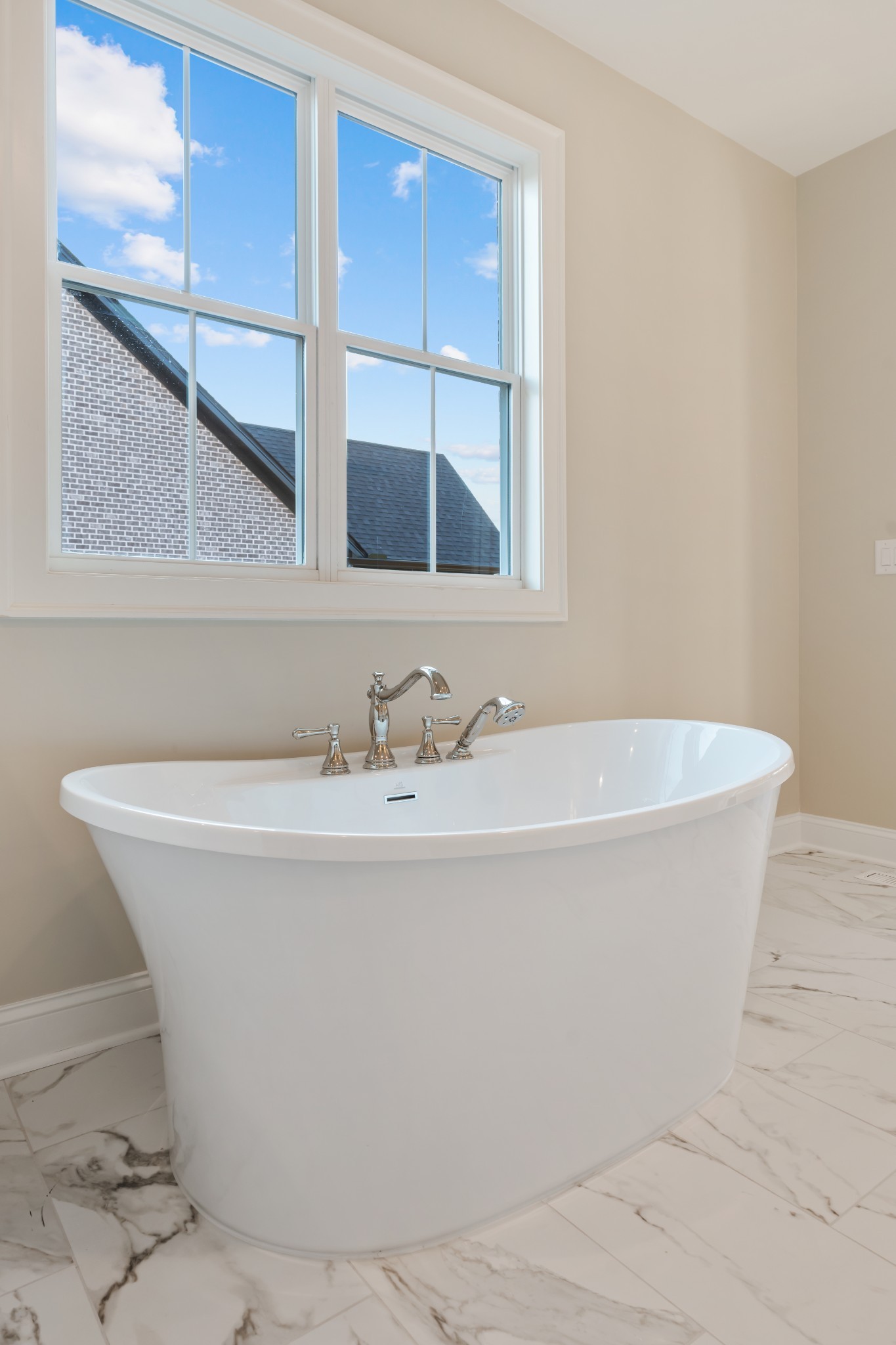 1107 Collin Drive Lebanon, TN 37087 - Photo 35 of 56 a white bath tub sitting next to a bathroom sink