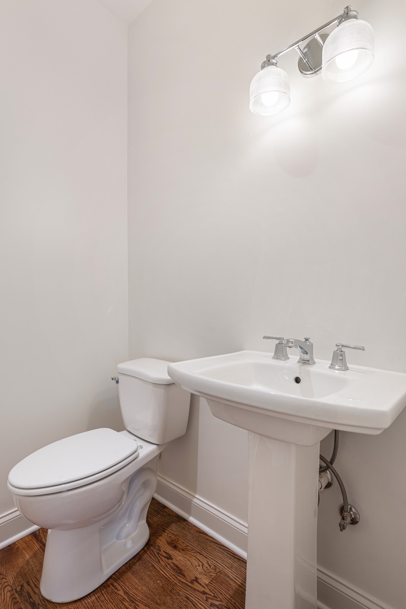 1107 Collin Drive Lebanon, TN 37087 - Photo 38 of 56 a bathroom with a sink a toilet and mirror
