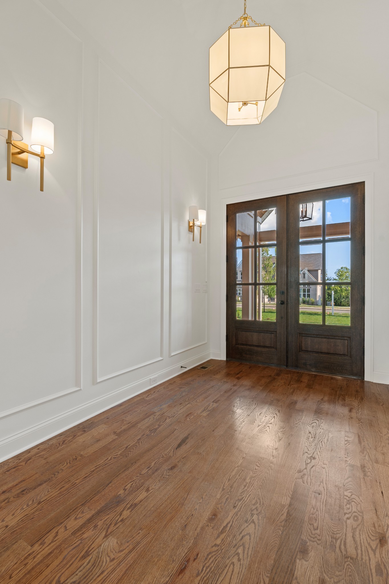 1107 Collin Drive Lebanon, TN 37087 - Photo 5 of 56 an empty room with wooden floor and windows