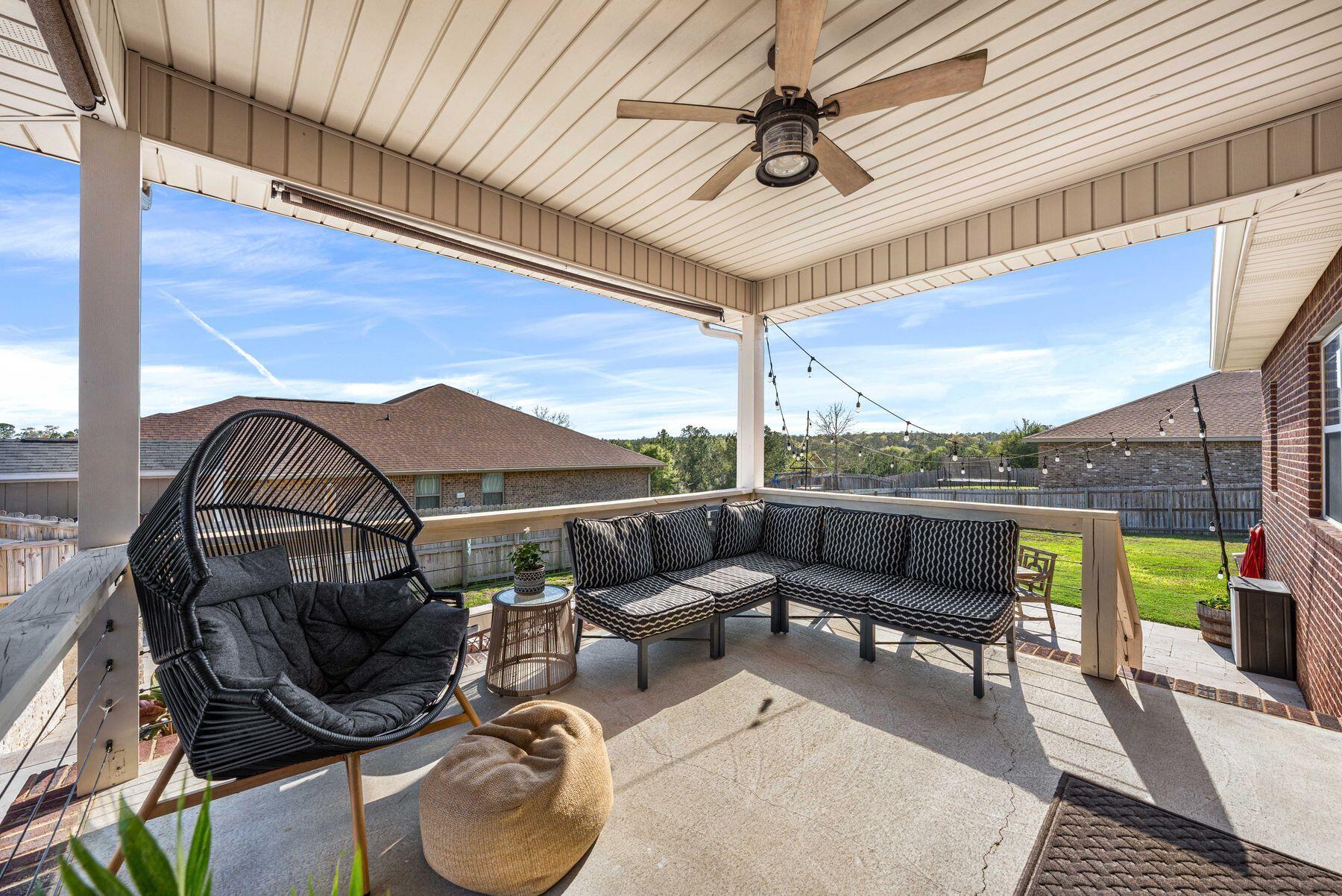 5778 Marigold Loop Crestview, FL 32539 - Photo 25 of 69 Covered Porch Overlooking Pool
