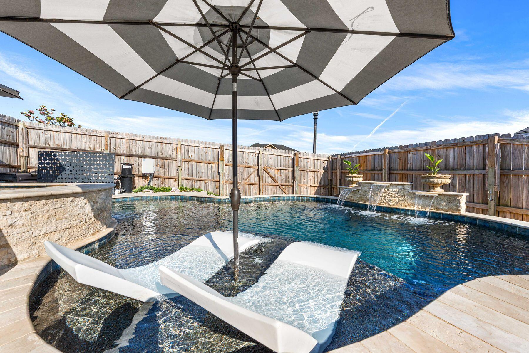 5778 Marigold Loop Crestview, FL 32539 - Photo 27 of 69 Pool Sun Deck with Umbrella