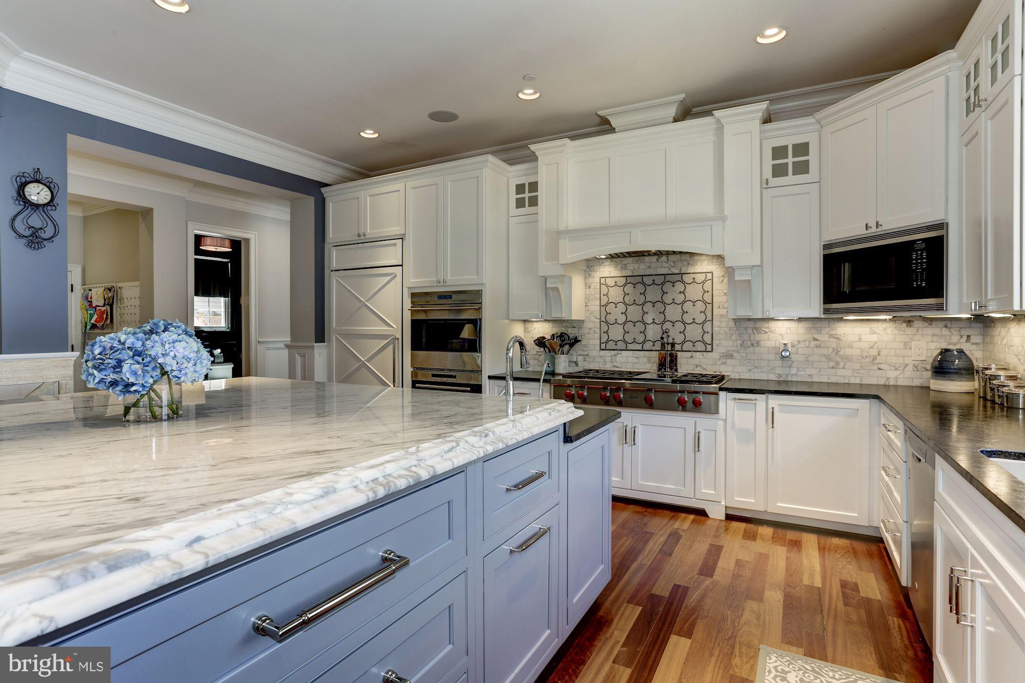 5313 Wehawken Road Bethesda, MD 20816 - Photo 12 of 50 Fantastic marble-top island with seating