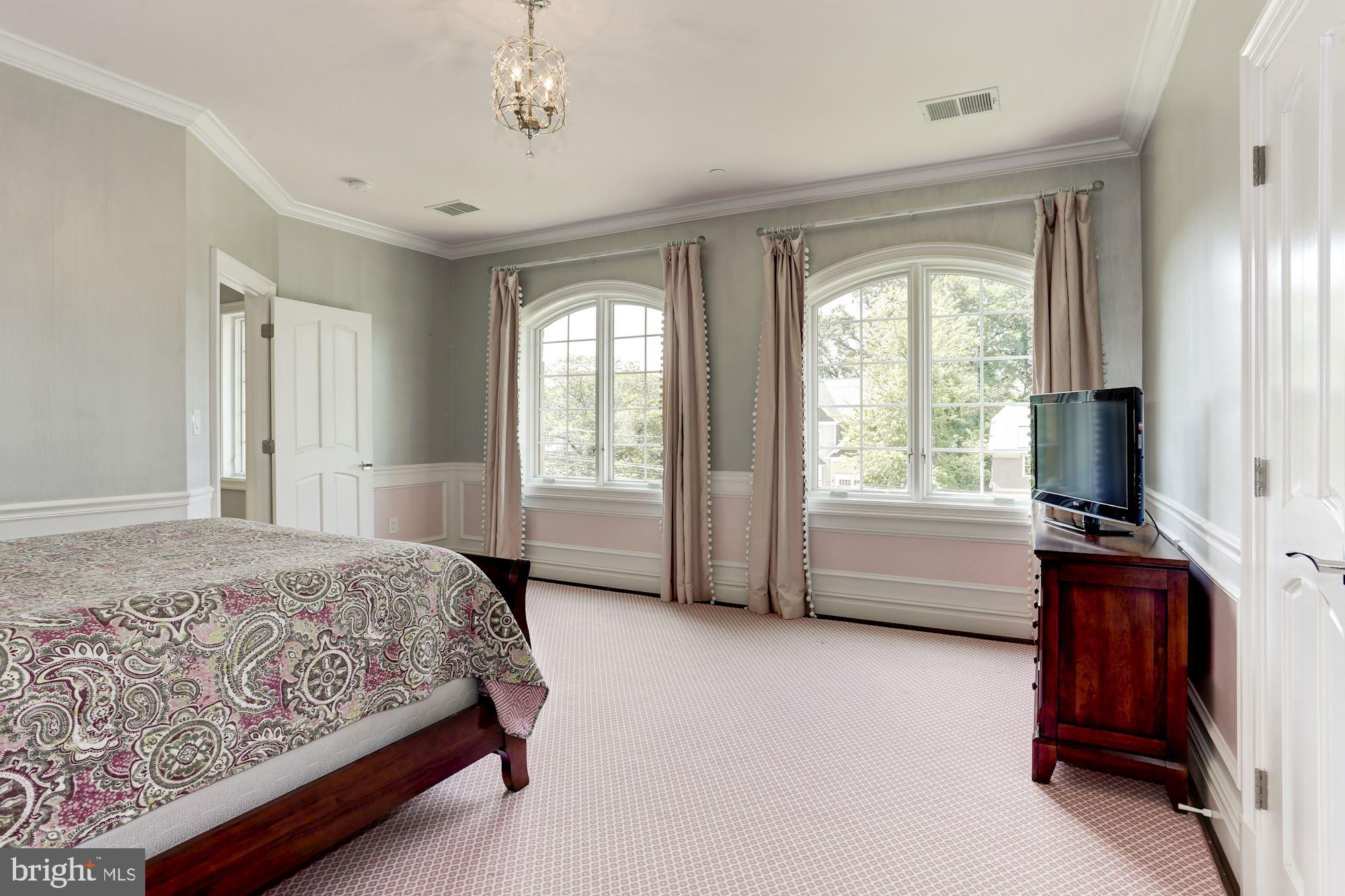 5313 Wehawken Road Bethesda, MD 20816 - Photo 27 of 50 Bedroom 2 with wool carpet area rug over hardwoods