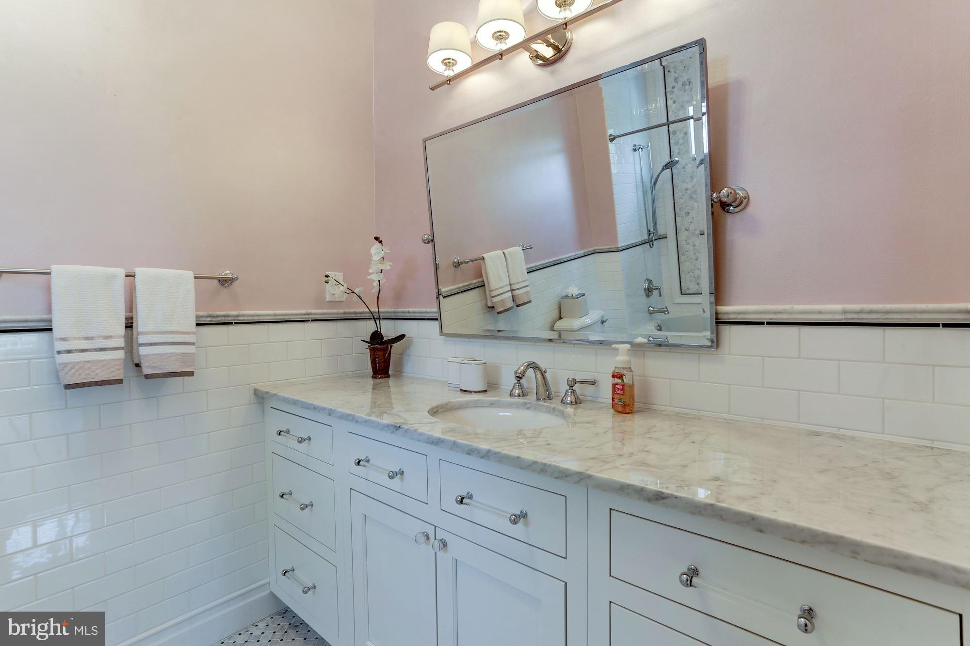 5313 Wehawken Road Bethesda, MD 20816 - Photo 29 of 50 En suite bathroom with basketweave tile floors