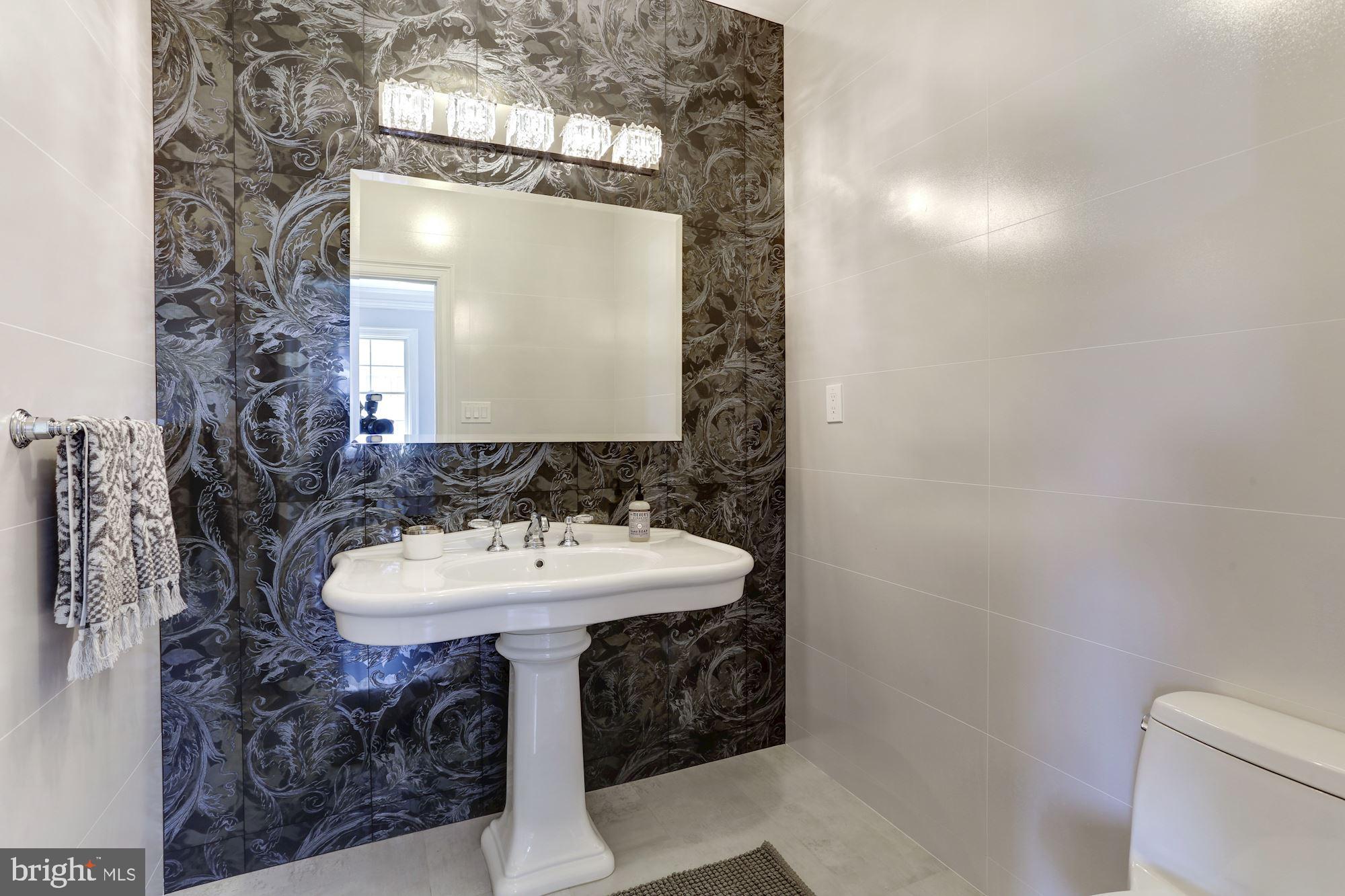 5313 Wehawken Road Bethesda, MD 20816 - Photo 31 of 50 Powder room on second floor