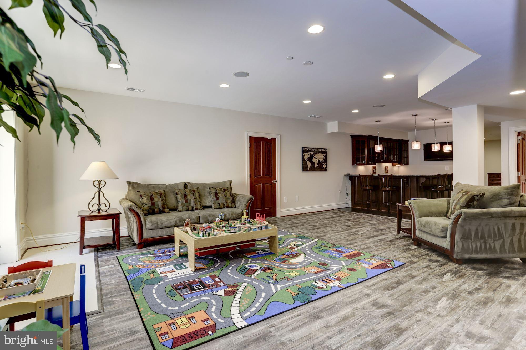 5313 Wehawken Road Bethesda, MD 20816 - Photo 34 of 50 Recreation room with french doors to backyard