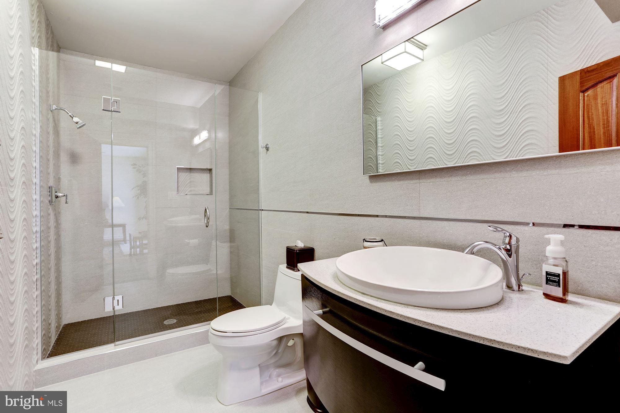 5313 Wehawken Road Bethesda, MD 20816 - Photo 37 of 50 Full guest bathroom in lower level