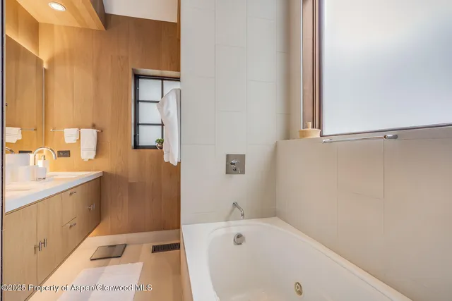 a view of a living room with a large window