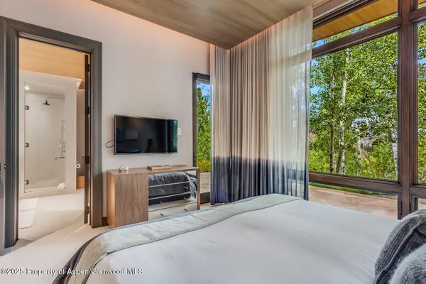 a kitchen with stainless steel appliances a sink and a stove