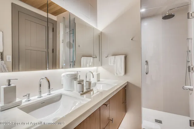 a bathroom with a bathtub and a sink