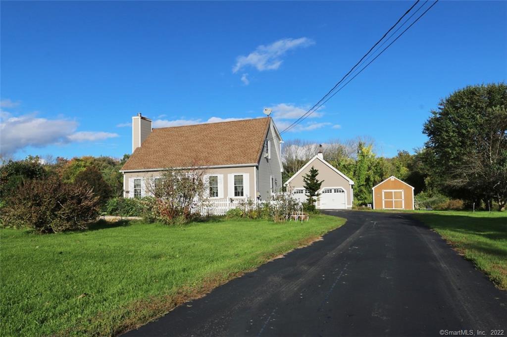 598 Waterman Road Lebanon, CT 06249 - Photo 1 of 1 a view of house with a big yard