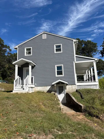a house view with a outdoor space