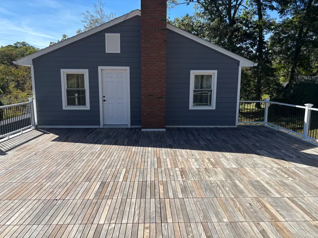 a view of a yard with a tree