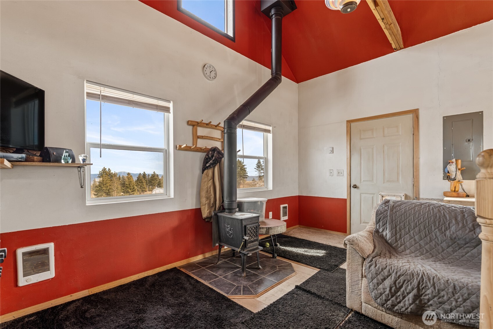 454 Harmony Heights Road Brewster, WA 98812 - Photo 21 of 24 a living room with furniture and a window