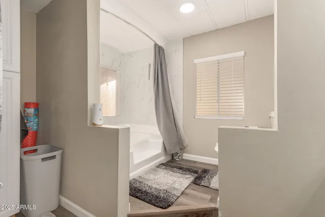 a view of an entryway with furniture and a window