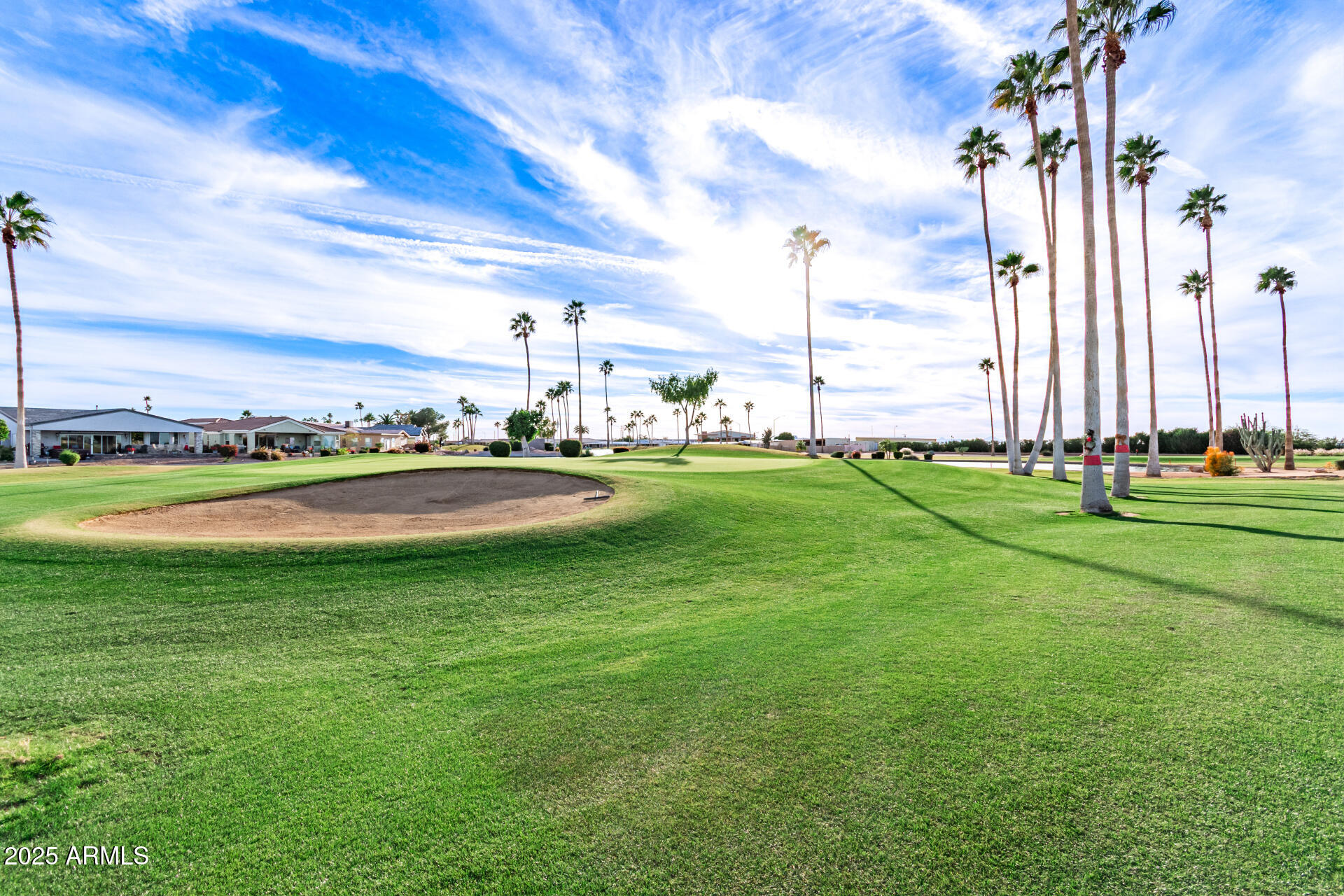 5263 East McDowell Road Mesa, AZ 85215 - Photo 21 of 40 a view of a golf course with a garden