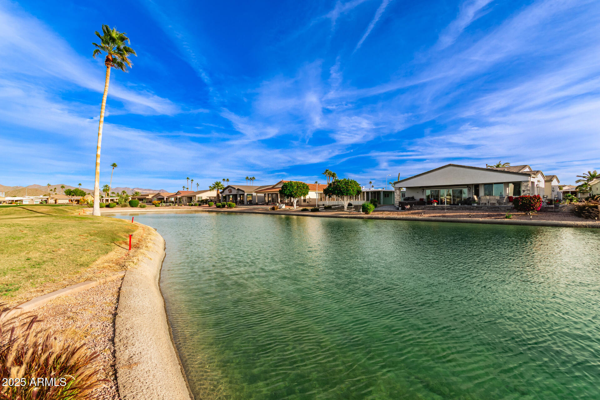 5263 East McDowell Road Mesa, AZ 85215 - Photo 24 of 40 a view of an ocean with a table and chairs