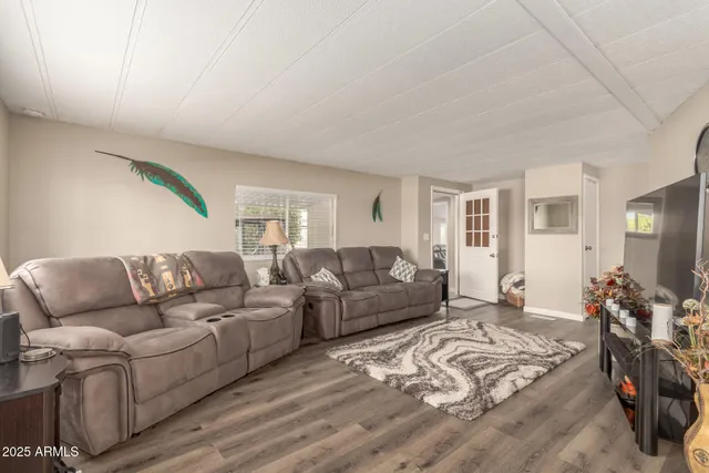 a living room with furniture and a couch