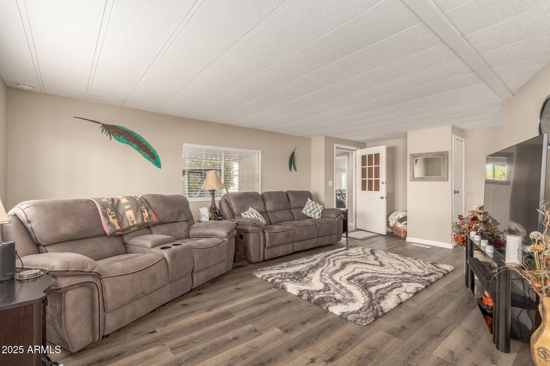 5263 East McDowell Road Mesa, AZ 85215 - Photo 3 of 40 a living room with furniture and a couch