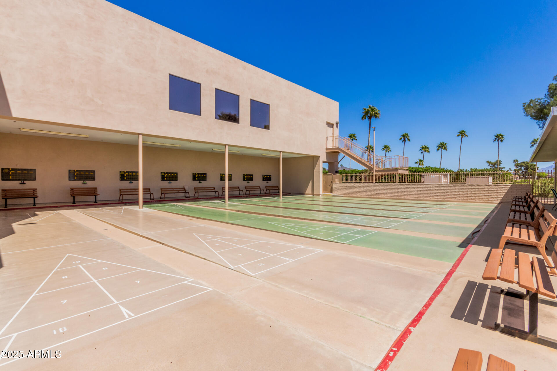 5263 East McDowell Road Mesa, AZ 85215 - Photo 34 of 40 a view of a tennis ground with large trees