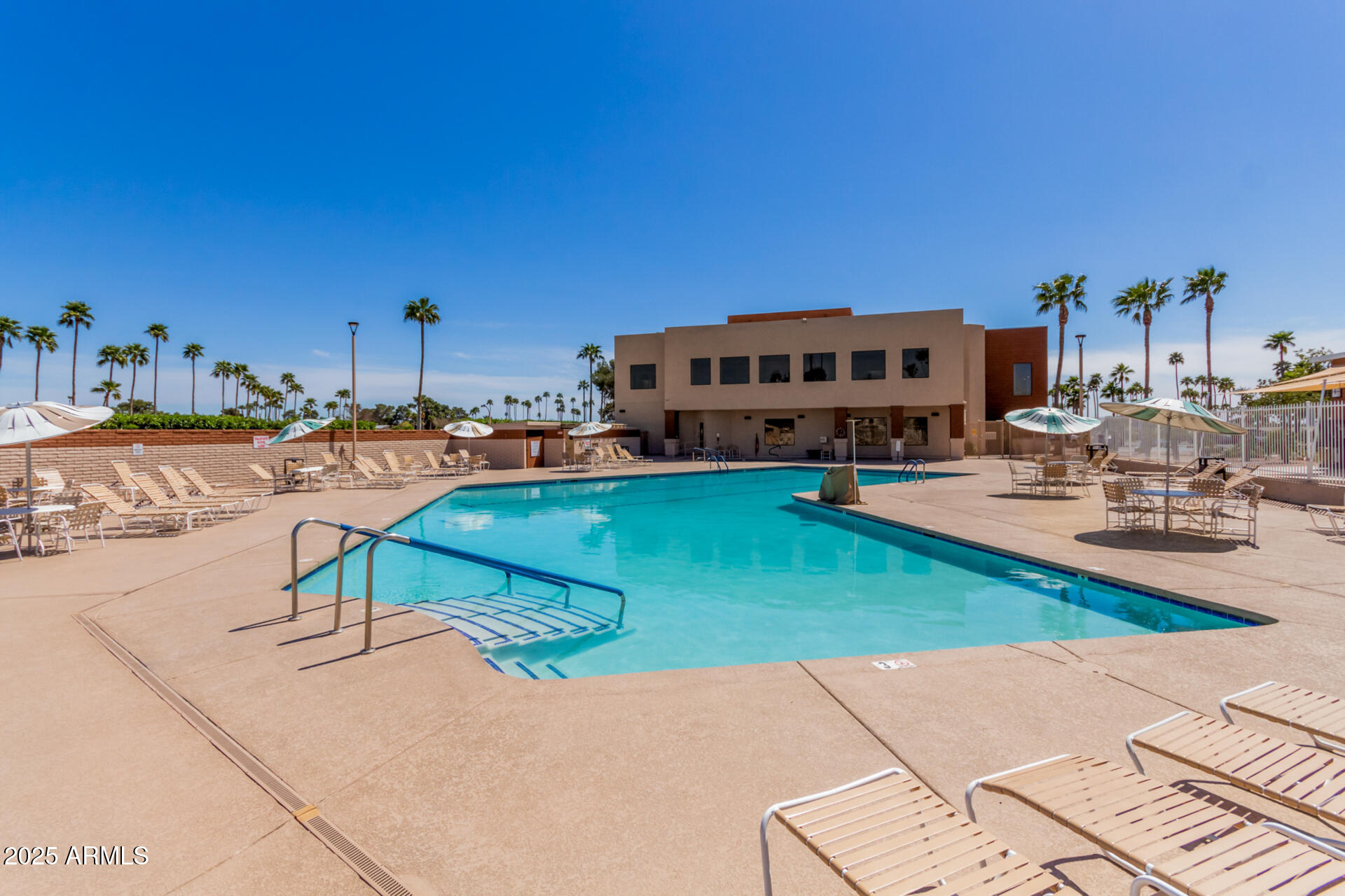 5263 East McDowell Road Mesa, AZ 85215 - Photo 39 of 40 a view of a house with swimming pool
