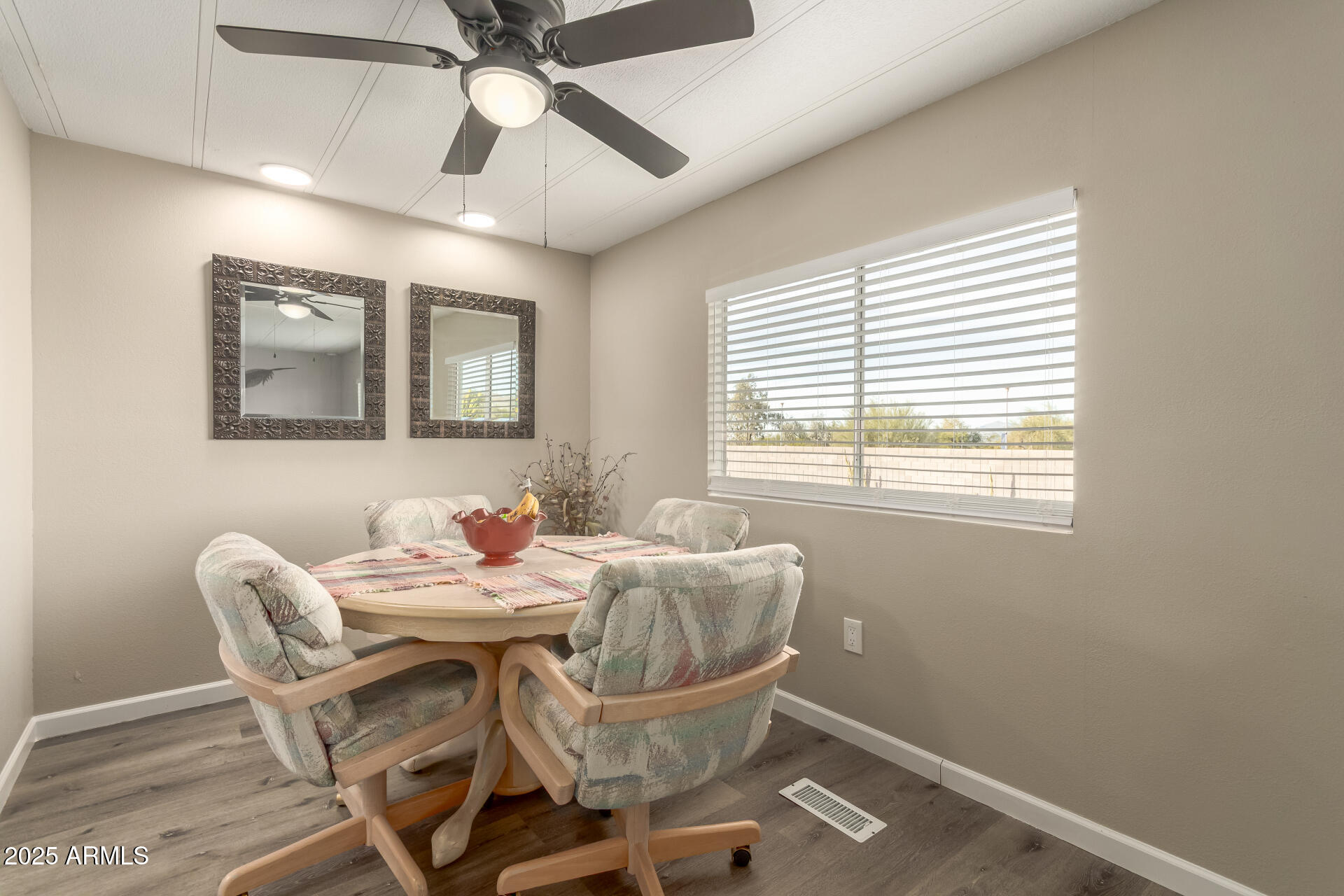 5263 East McDowell Road Mesa, AZ 85215 - Photo 7 of 40 a dining room with furniture and window