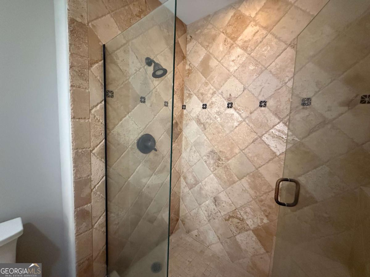 2255 Peachtree Road Northeast, Unit 322 Atlanta, GA 30305 - Photo 17 of 31 a bathroom with a shower