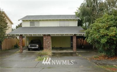 122 Pelly Avenue North Renton, WA 98057 - Photo 1 of 1 a front view of a house with a garden
