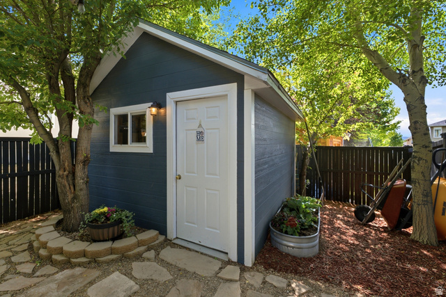 5196 Rodeo Circle Oakley, UT 84055 - Photo 51 of 57 SHE SHED, detached storage shed with blue siding and white trim