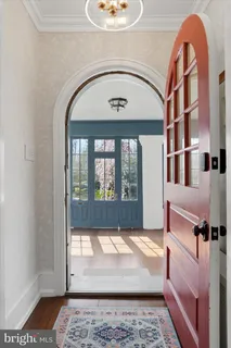 a view of an entryway with a rug